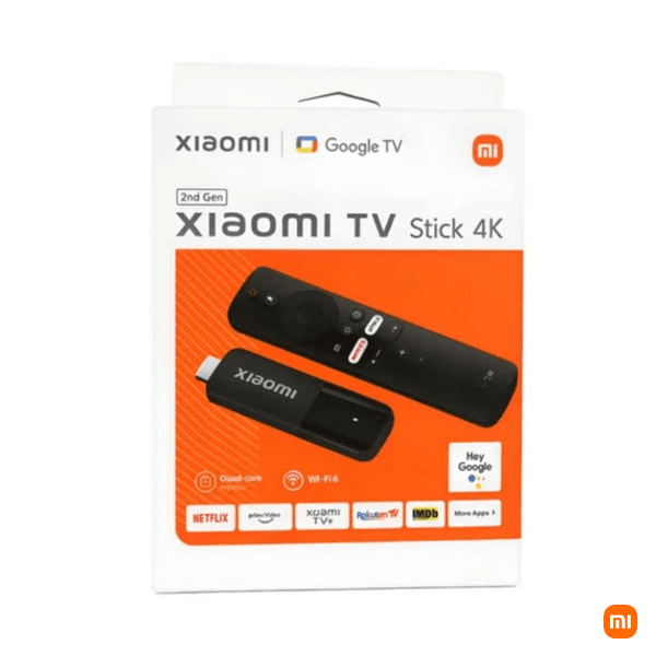 Xiaomi TV Stick 4K en Perú: control remoto negro con botones de acceso directo a Netflix y Prime Video sobre fondo oscuro.
